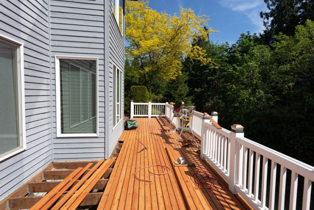 Is It Cheaper To Replace Or Repair Deck? In 2024 - Elegant
